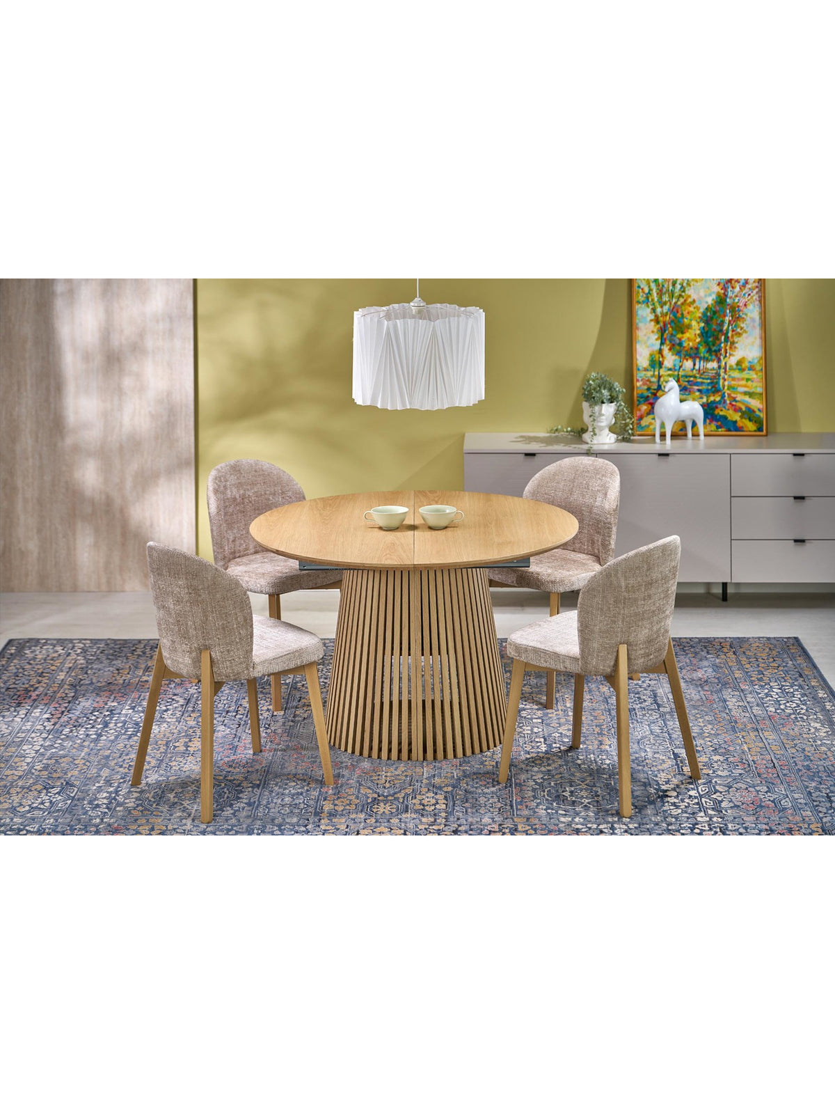 Rozkládací kulatý stůl Brevon 120-210x120 cm v přírodním dubu s dekorativní podnoží