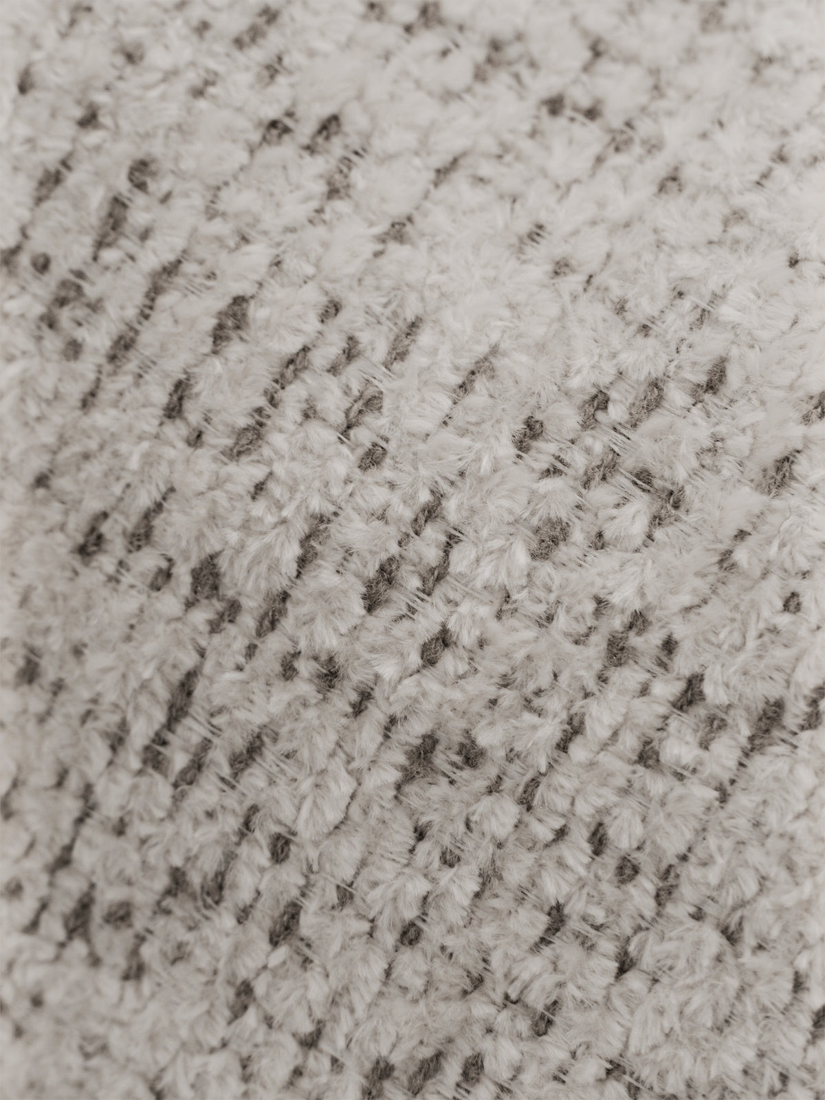 Rozkládací pohovka Velamo s tmavě béžovým potahem z tkaniny Bella 55, detail látky